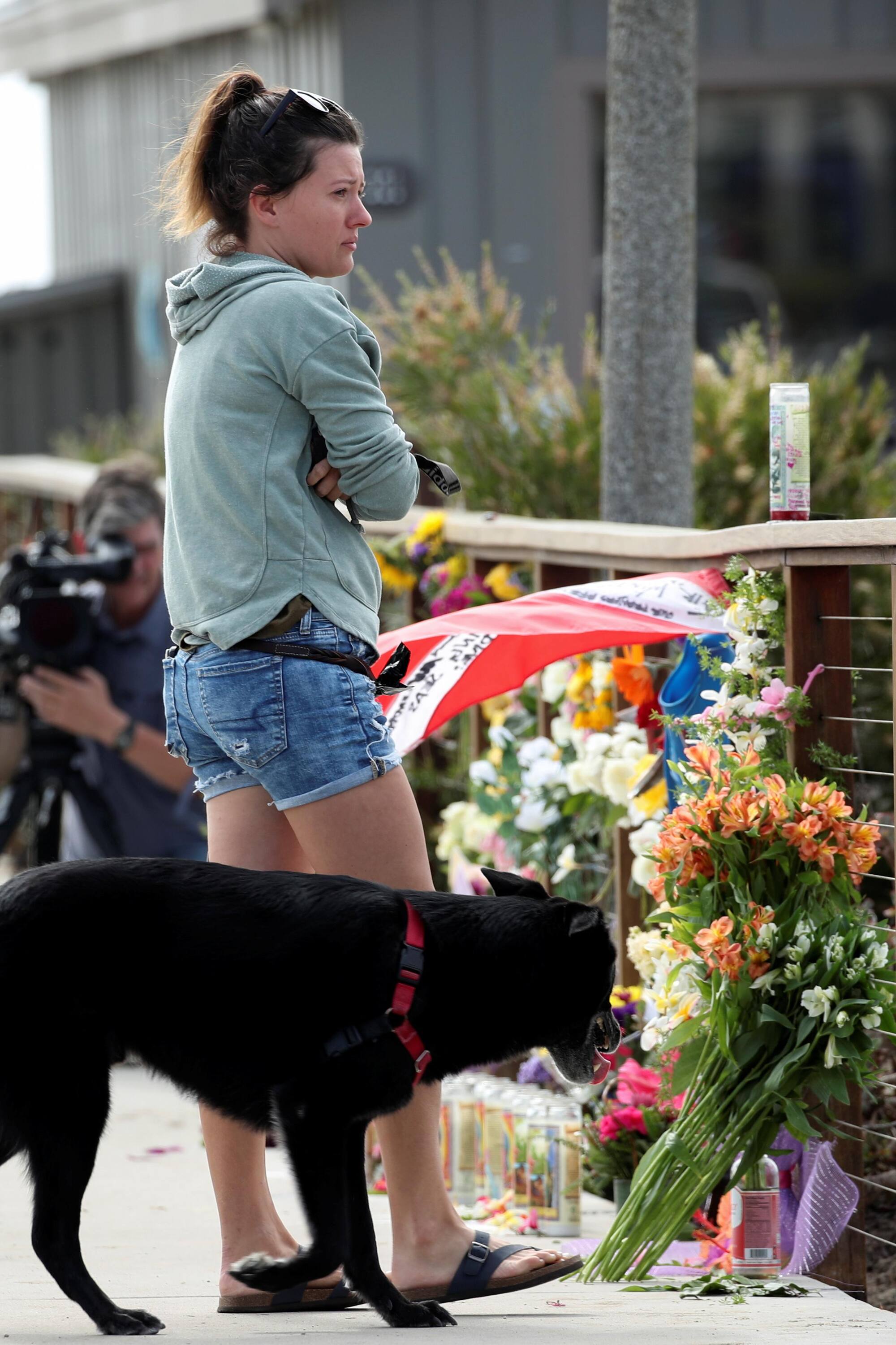 Investigation begins into California boat fire as grim search goes on for bodies