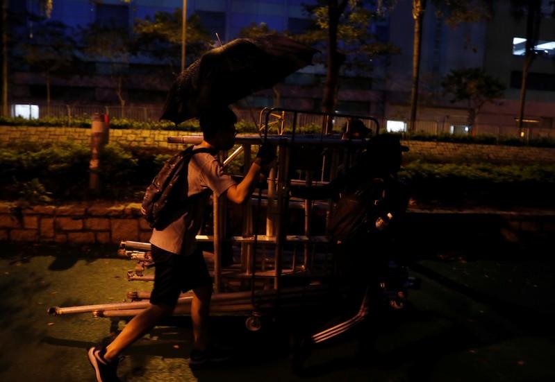 Hong Kong police break up clashes between rival protesters