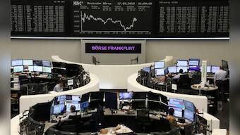 Global Markets: Stocks fall, Treasury yield curve flattens after Fed cuts rates but sends mixed signals