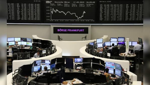 Global Markets: Stocks fall, Treasury yield curve flattens after Fed cuts rates but sends mixed signals