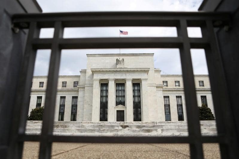 Fed pumps more cash as key rate breaks above target