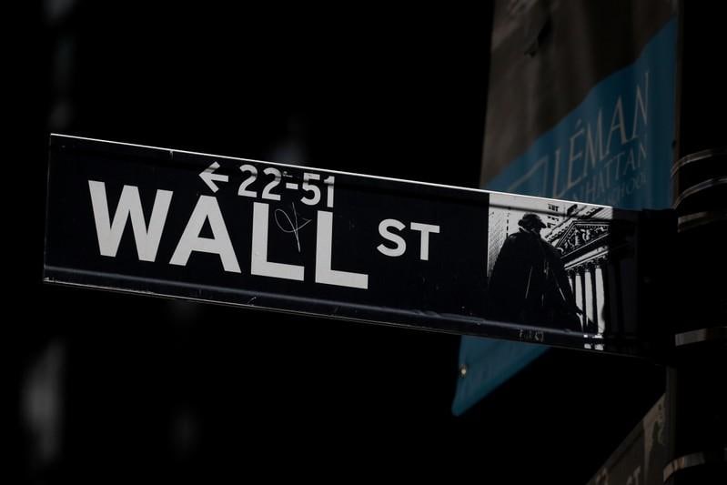 Wall Street near flat as mixed economic data signal caution