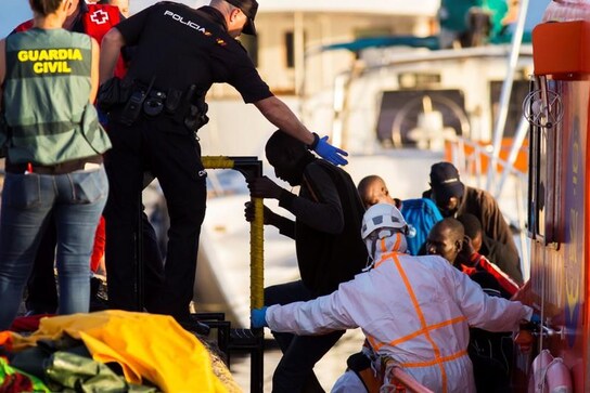 Dozens of migrants in a wooden canoe rescued off Canary Islands Dozens of migrants in a wooden canoe rescued off Canary Islands
