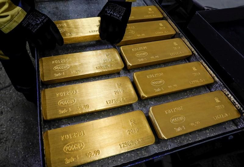 Gold recovers after sharp fall strong dollar caps gains