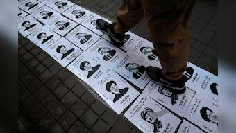 Hong Kong police fire tear gas, water cannon to halt protest as China National Day nears