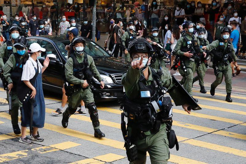 Hong Kong police fire pepper balls at protesters opposed to election delay new law