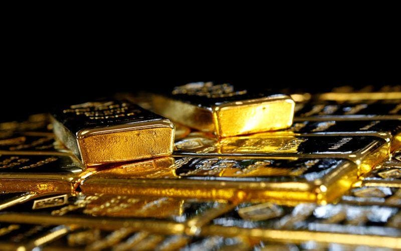 Gold rises 1 as dollar weakens after ECB stands pat on policy