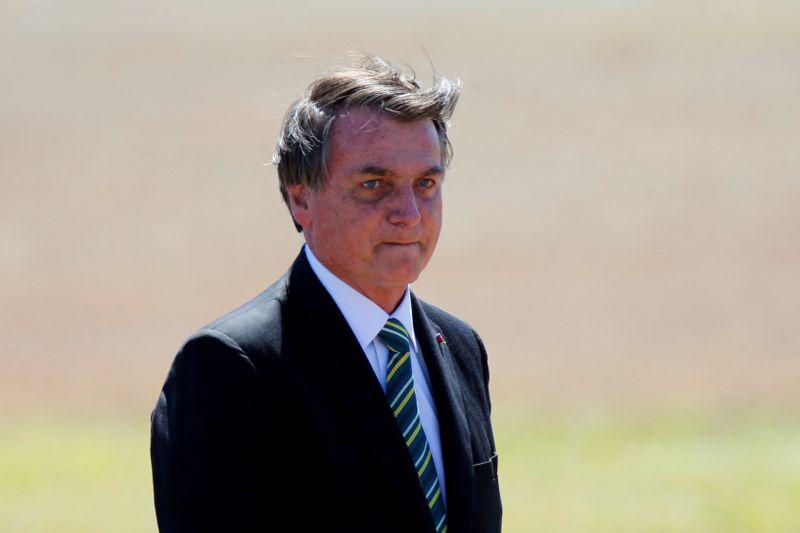 Brazils Bolsonaro scraps new welfare plan economy minister plays down rift