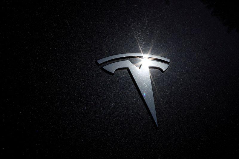 Teslas value drops 50 billion as Musks promised cheaper battery three years away