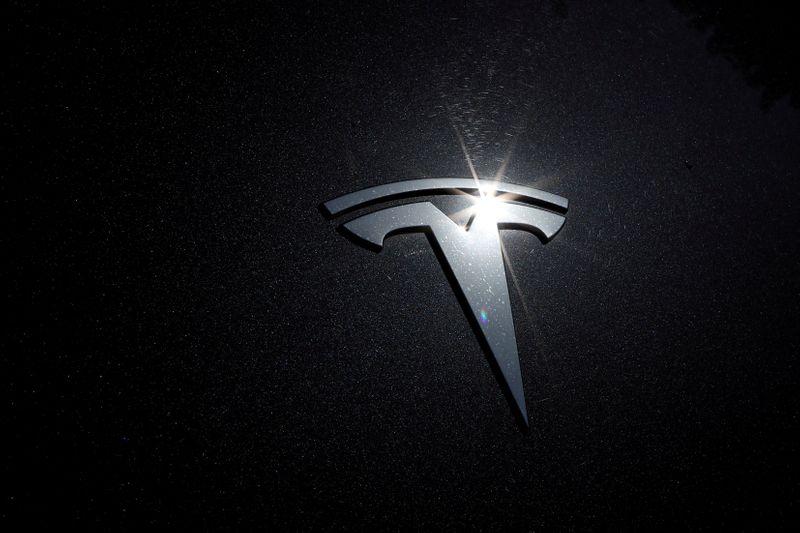 Tesla's Elon Musk promises dramatic cuts in electric car costs, but investors must wait Tesla's Elon Musk promises dramatic cuts in electric car costs, but investors must wait