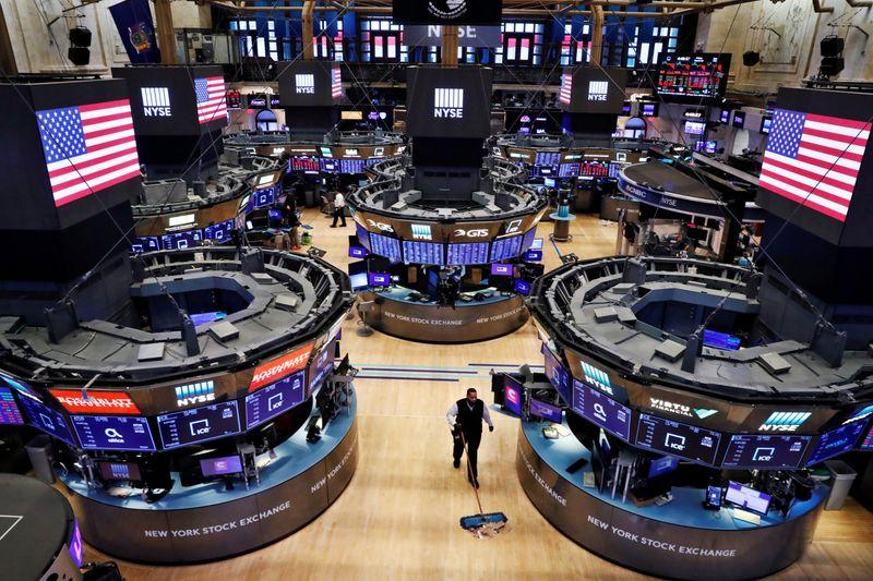 Wall Street retreats as business activity slows
