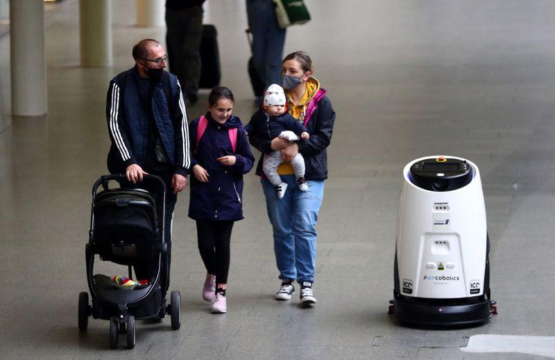 Robots target coronavirus with ultraviolet light at London train station