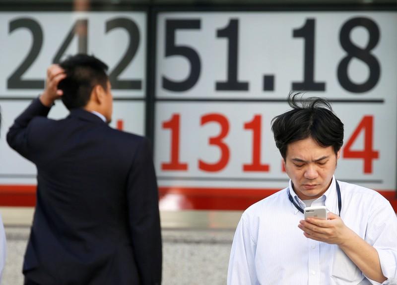 Global stocks dip amid Italy angst, but tech lifts Dow Global stocks dip amid Italy angst, but tech lifts Dow