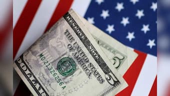 Dollar scales 11-month peak on yen as U.S. yields surge