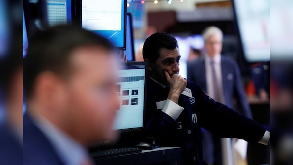Dow, S&P 500 dip slightly; materials sell off