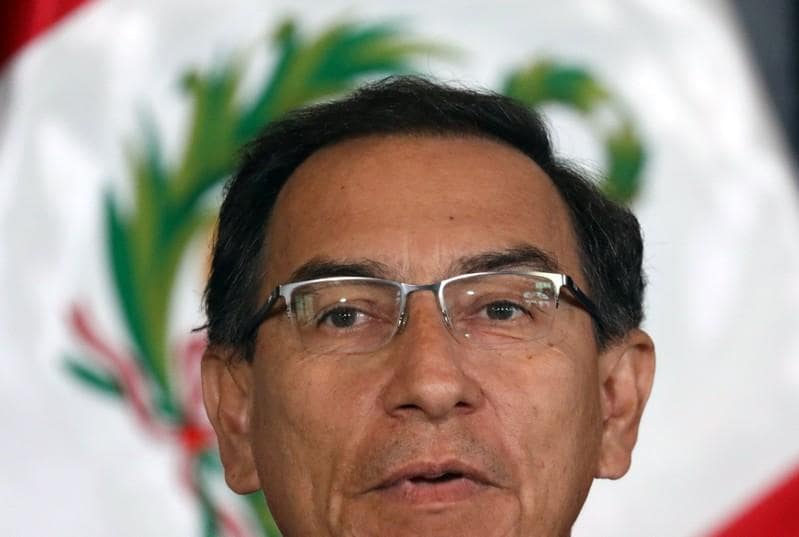 Support for Peru's president surges after battle with Congress