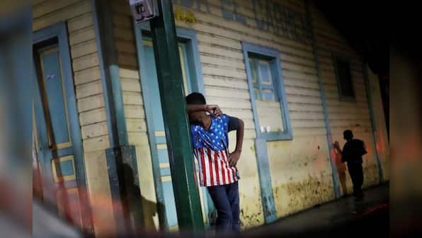 Migrant caravan streams out of Guatemala, halted by Mexican police