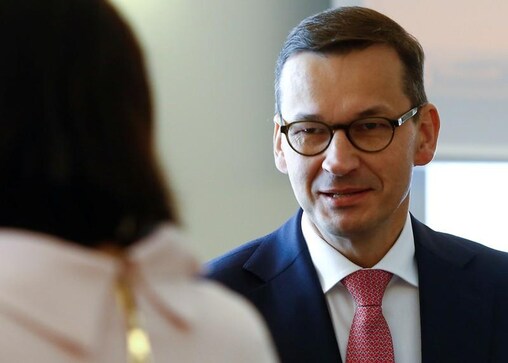 EU court orders halt to Polish judicial overhaul; leader says to appeal EU court orders halt to Polish judicial overhaul; leader says to appeal