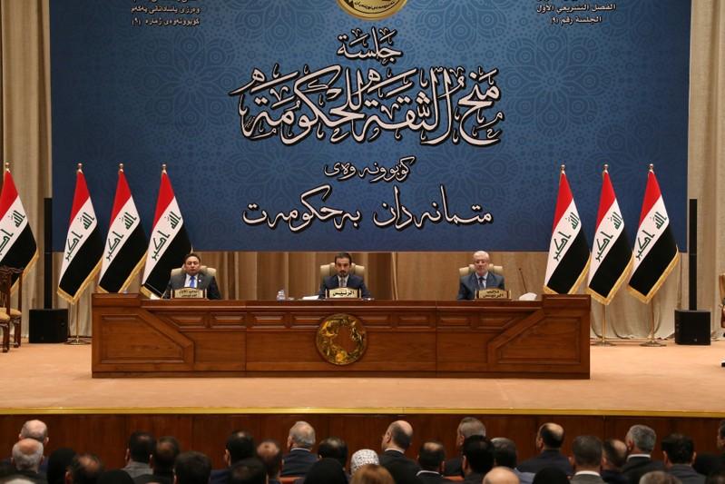 Iraq PM sworn with partial cabinet as lawmakers disagree