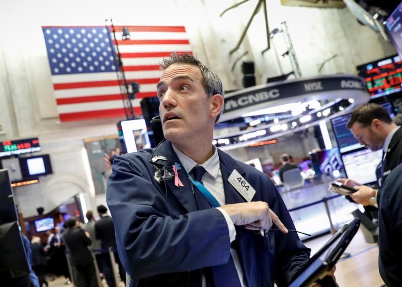 Wall Street off session lows as Alphabet pares losses