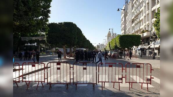 Woman blows herself up in Tunis, wounding 15 people including 10 police officers