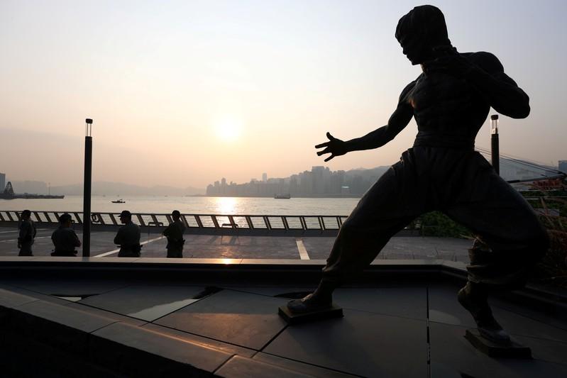 Restive Hong Kong hunkers down as China’s birthday celebrations begin