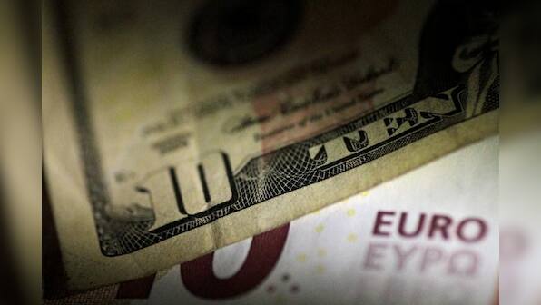 Dollar skids after weak U.S. services data