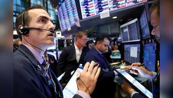 Stocks fall, dollar rises as investors worry about trade