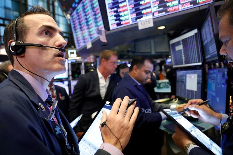 Stocks fall, dollar rises as investors worry about trade Stocks fall, dollar rises as investors worry about trade
