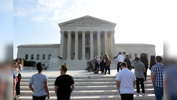 U.S. Supreme Court kicks off new term, with Justice Thomas absent