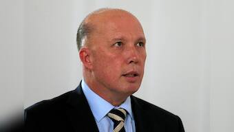 Senior Australian minister says China is behaving badly, draws rebuke