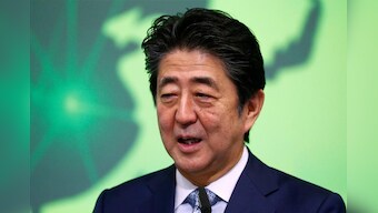 Japanese PM sends offering to war-dead shrine but will not visit - Kyodo