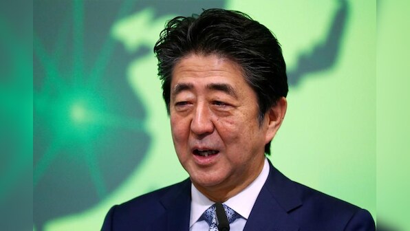 Japanese PM sends offering to war-dead shrine but will not visit - Kyodo