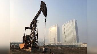 Oil falls, fanned by inventory rise and global demand worries