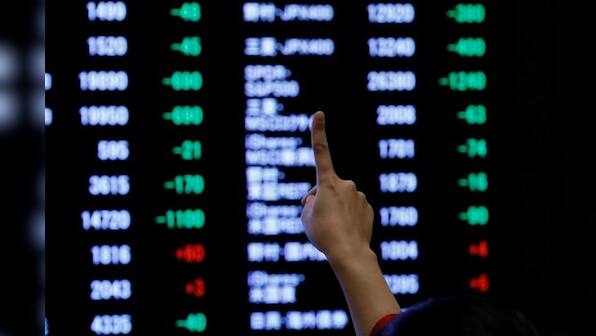 Asia tries to see light in trade talks, Brexit votes