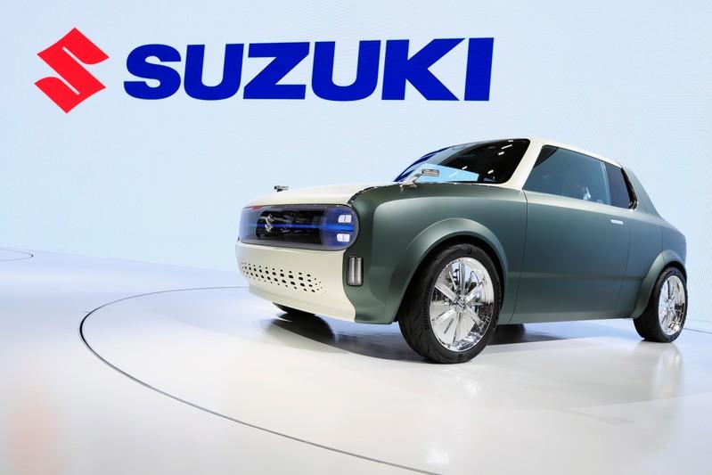 To go big on EVs, Japanese car makers think super-small To go big on EVs, Japanese car makers think super-small