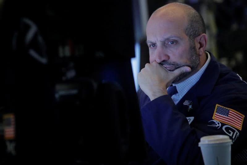 Wall Street ticks higher but chip stocks tumble