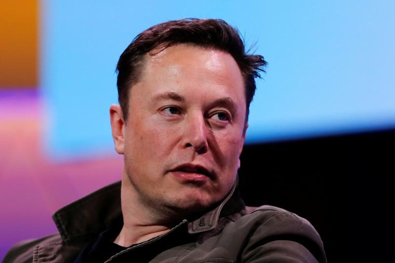 Tesla posts surprise quarterly profit on record deliveries