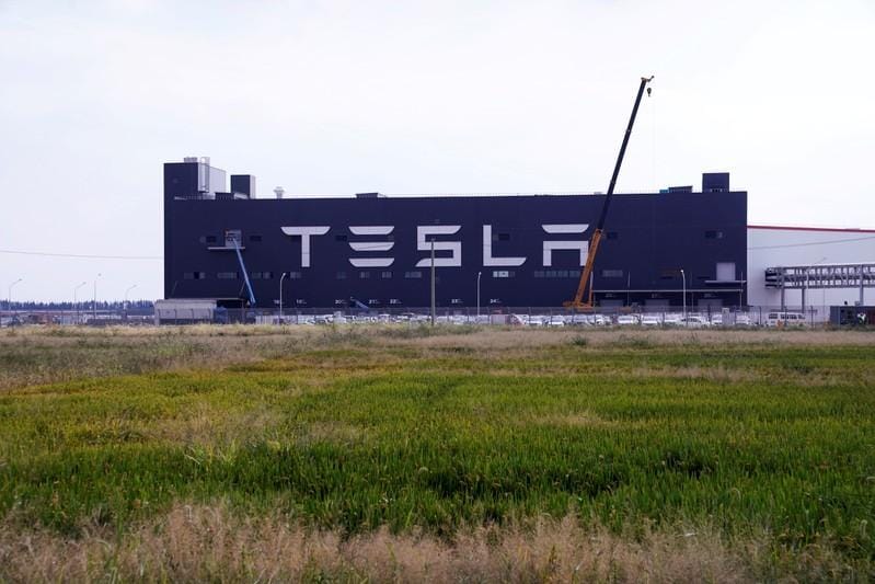 Tesla shares soar 21 as surprise profit answers sceptics