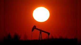 Oil falls on weak Chinese data, forecasts for U.S. crude stocks build