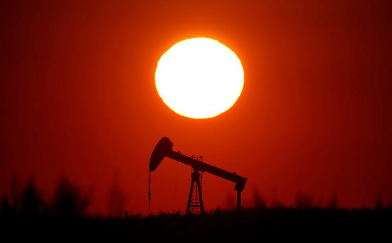 Oil pares losses on easing trade tensions firmer US equities