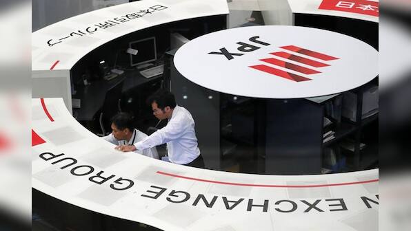 Global share rally pauses on trade risks ahead of Fed