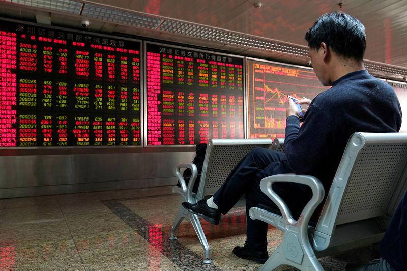 Asian stocks mixed on fading US stimulus hopes virus concerns