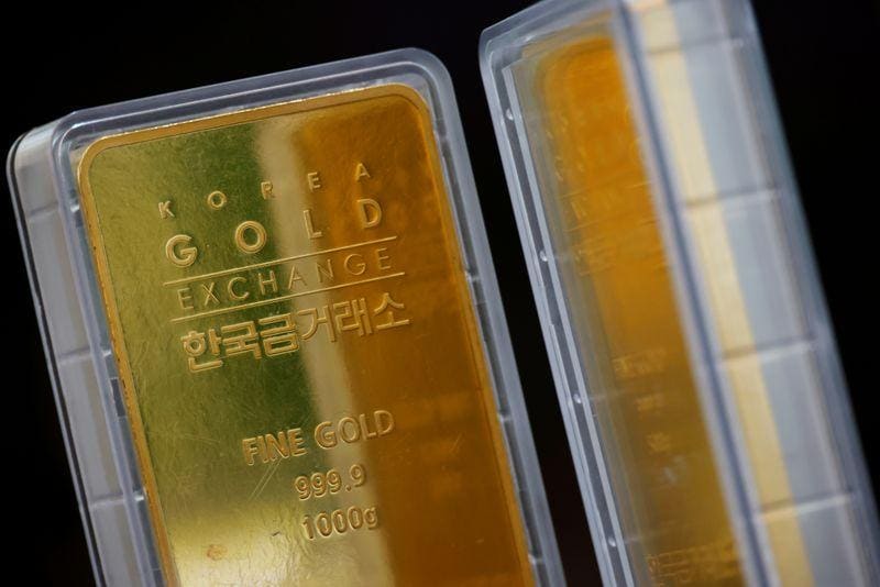 Gold eases on buoyant dollar as US stimulus bets fade