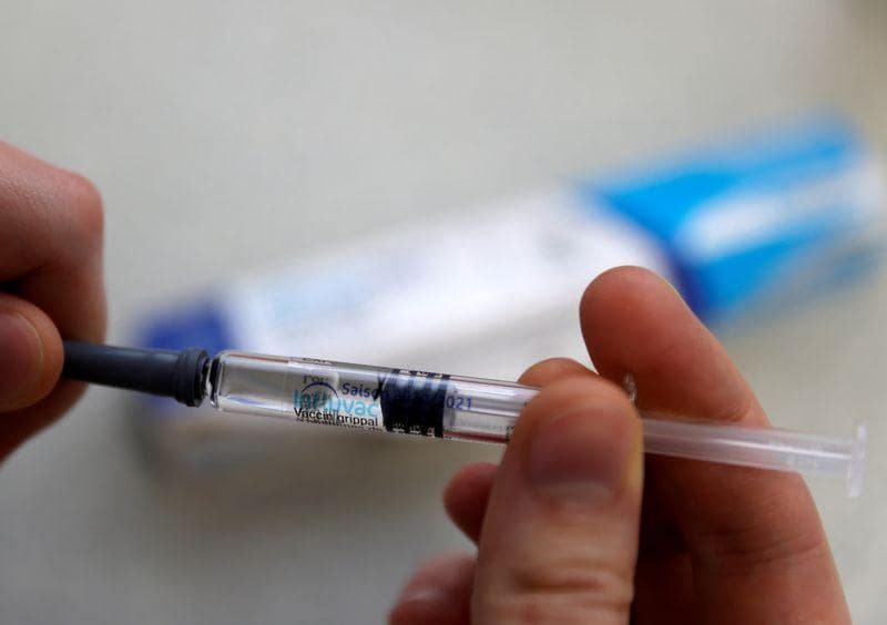 European cities plead for more flu shots as winter looms pandemic rages
