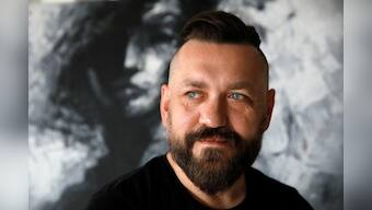 Polish artist recreates famous Solidarity poster for abortion rights protests