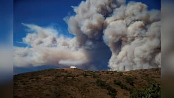 Rain looms as search for California wildfire missing continues