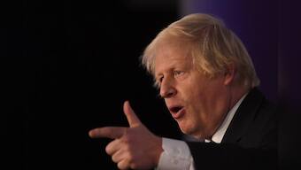 Boris Johnson, sniping at May, calls for 'no deal' Brexit minister