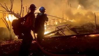 Firefighters make gains against wildfire in Southern California farm country