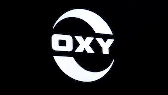 Occidental to slash spending after swinging to loss